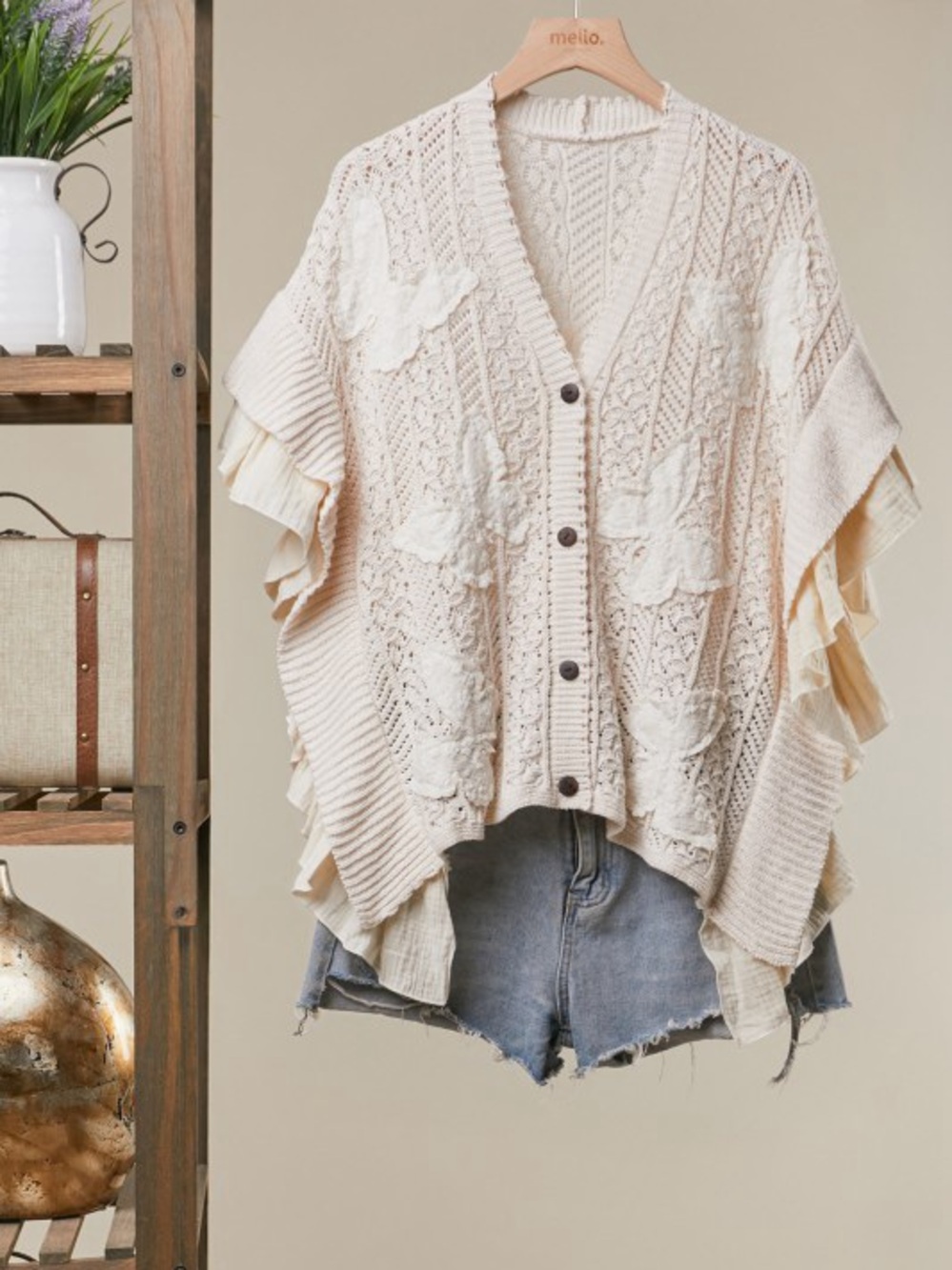 E71. BUTTERFLY PATCH RUFFLE SLEEVE LACE KNIT
CARDIGAN